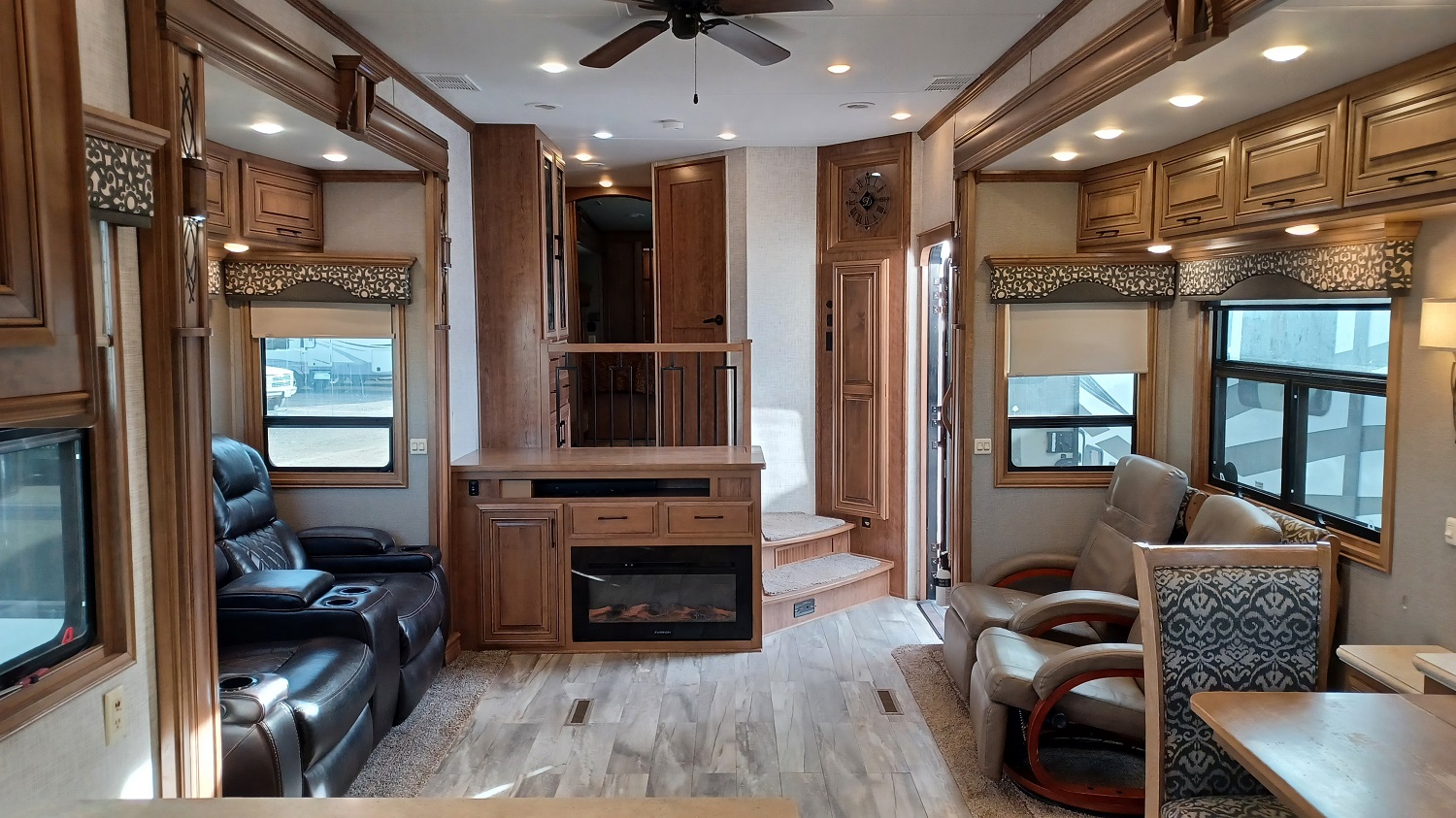 Livingroom Featuring Theatre Seats and Two Additional Euro Recliners