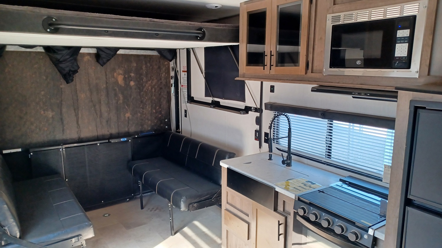 kitchen in the garage with two beds or a bed and a dinette