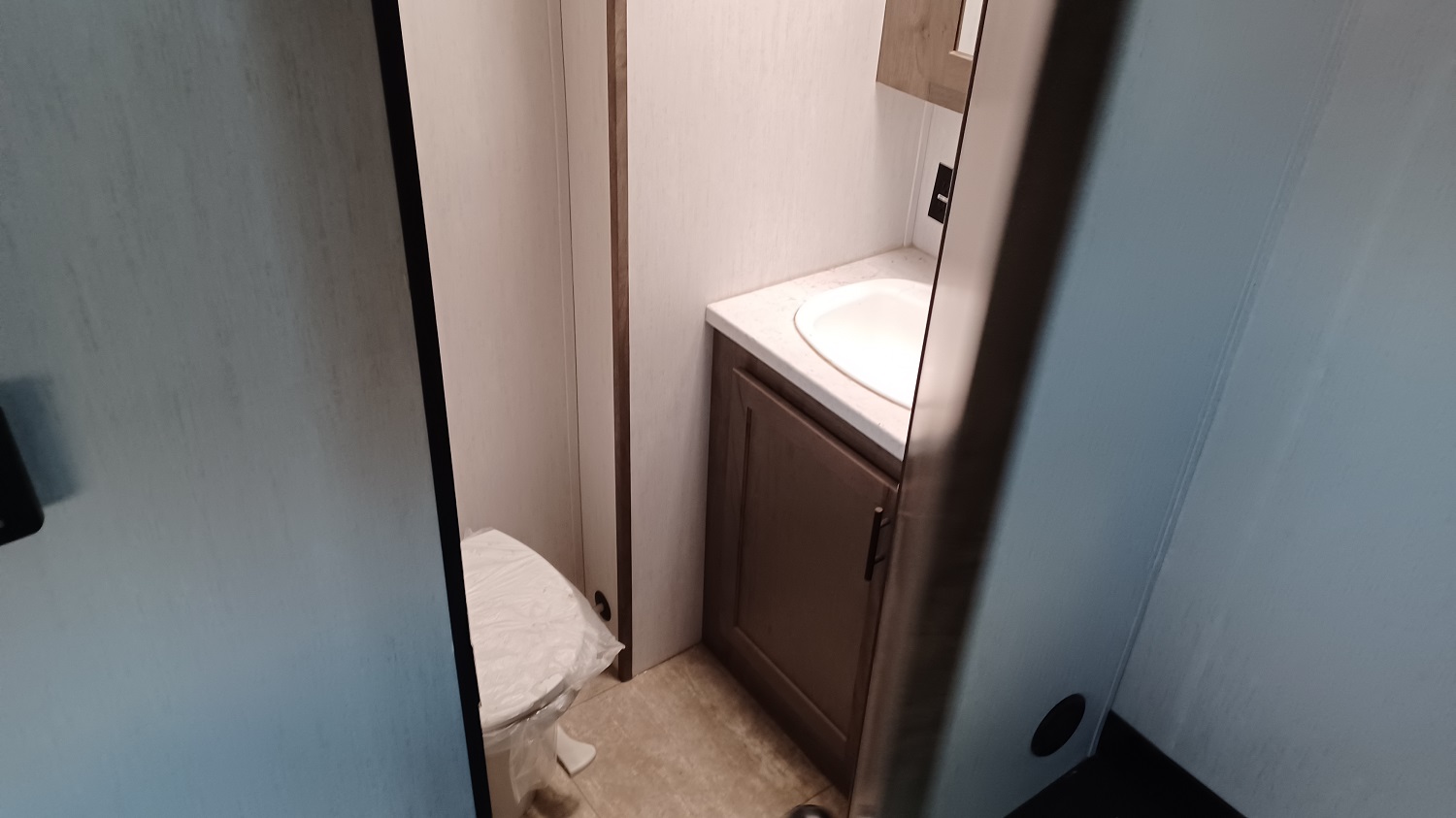 there's a toilet in the garage so you don't have to track up momma's clean floor to go potty